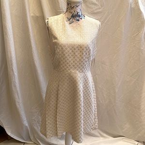 Maison Jules, Medium pleated flared sleeveless dress with gold polka dots